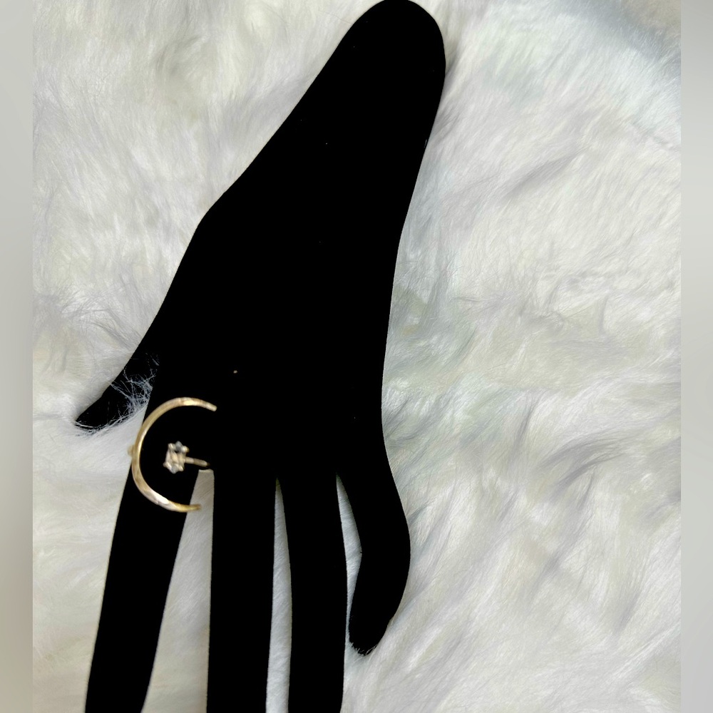 Contemporary Half Moon Statement Ring with Diamond-link Stone.